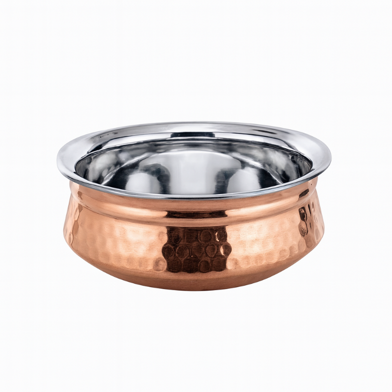 Copper and stainless steel bowl on a white background