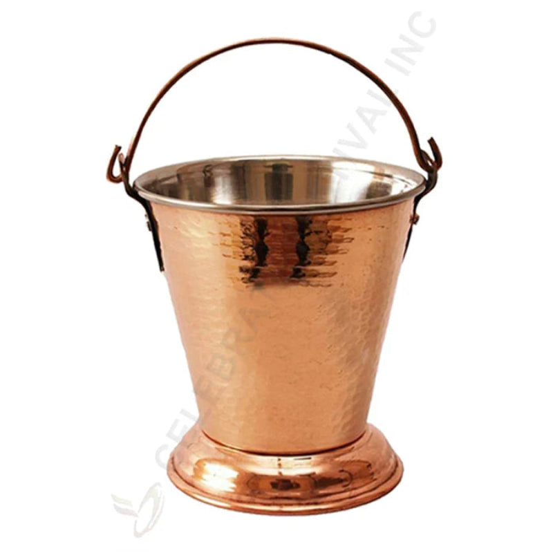 Copper bucket with a handle on a white background