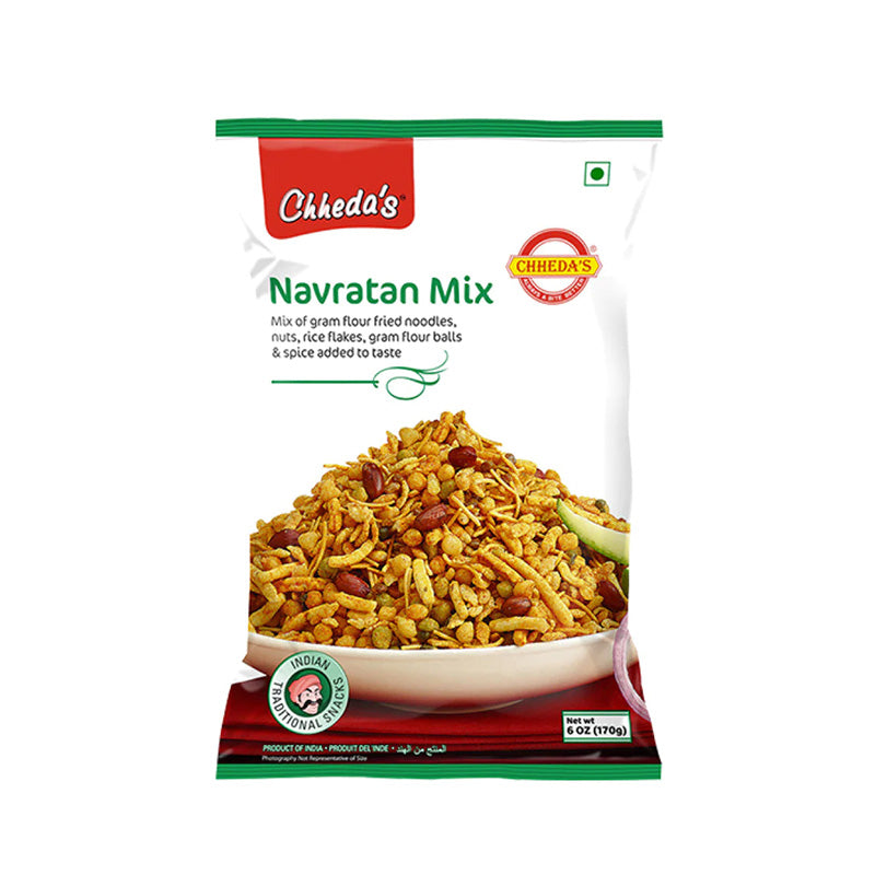 Packaging of Chheda's Navratan Mix, featuring the product name and an image of the mix with nuts, spiced chickpea flour noodles, and crispy lentils.