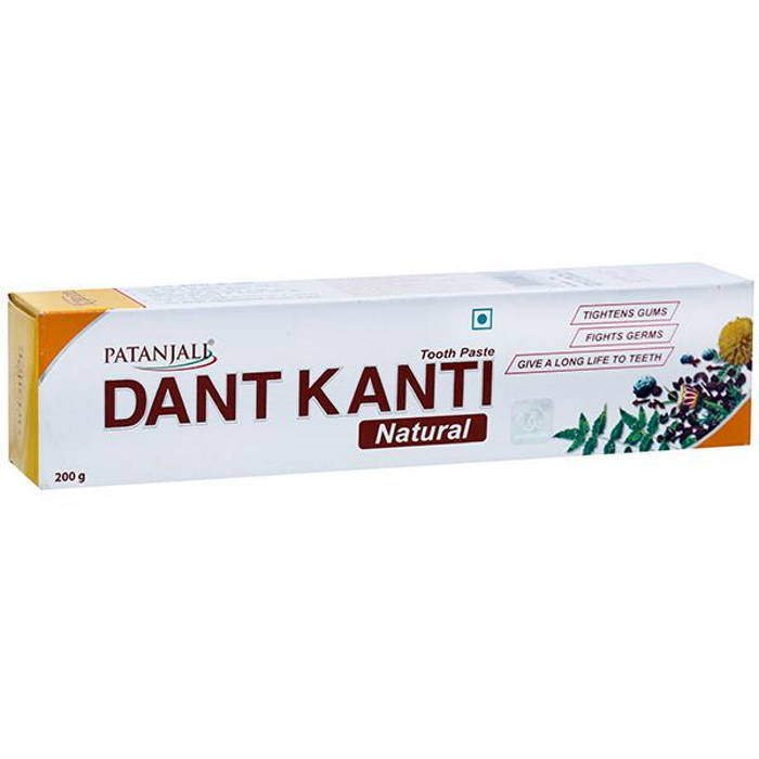 Patanjali Dant Kanti Toothpaste packaging, which is white with images of herbs and text displaying the product name and size 200g.