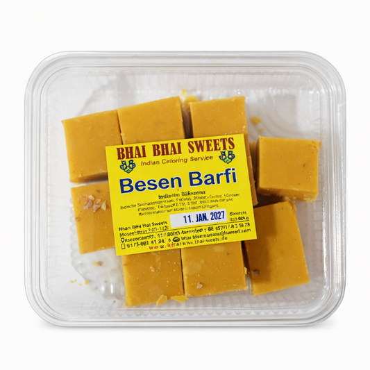 Packaged Besen Barfi with Bhai Bhai Sweets label on a white background