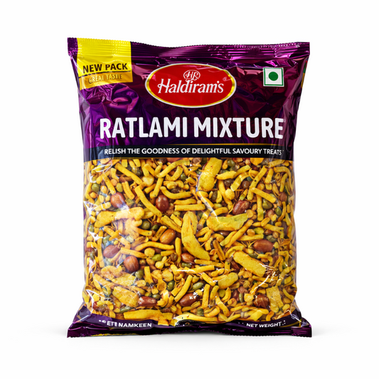Packaged Ratlami Mixture from Haldiram's with purple packaging and yellow content.