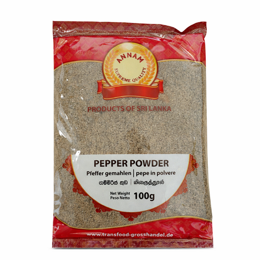 Packaging of Annam pepper powder with red and gold design on a white background