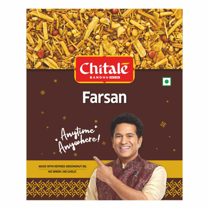 Chitale Bandhu Farsan packaging with a man pointing at text on a white background