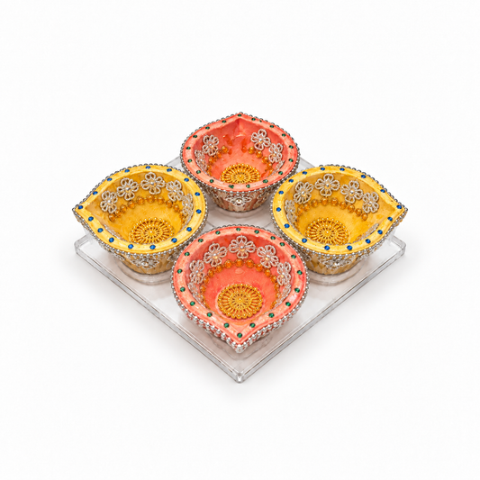 Diwali Diyas – Set of 4 (Orange and Yellow with Silver and Gold Decorations)