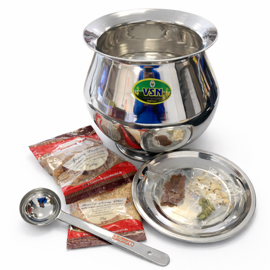Stainless steel pot with lid, measuring spoon, and packets on a white background
