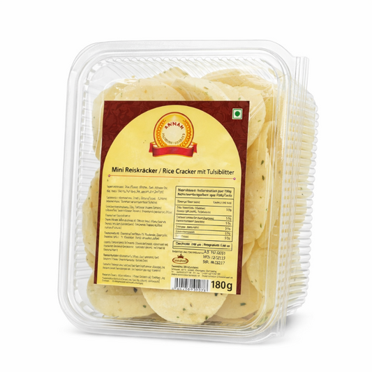 Packaged rice crackers with a label on a white background