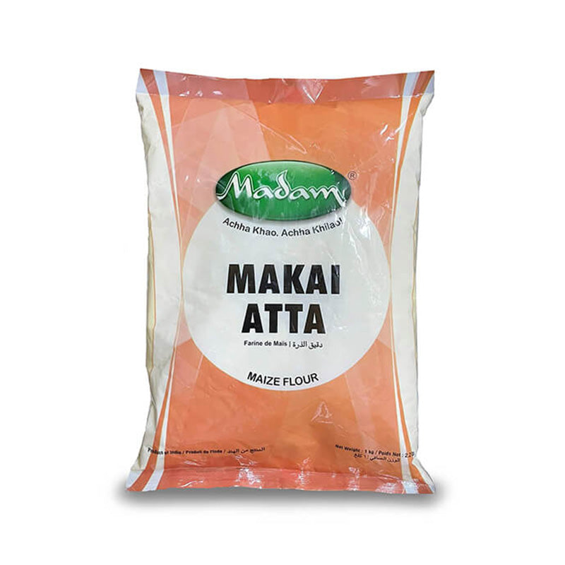 Packaging of Madam Makai (Corn) Flour 1kg, showing the product in a clear plastic bag with a label and branding.